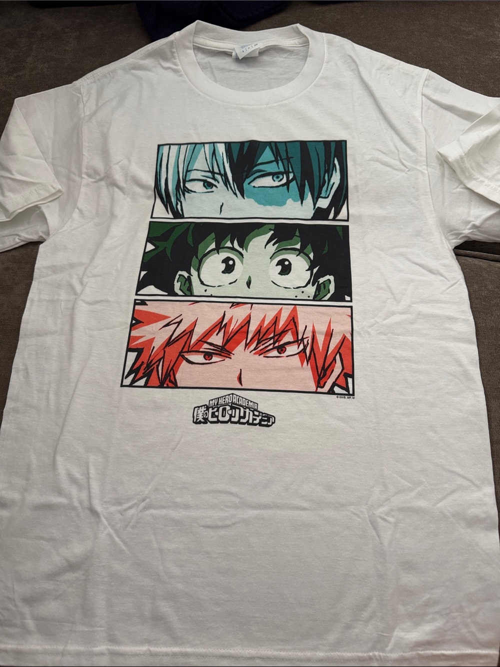 White Short-Sleeve Graphic Tee with Green, Teal, and Red Panels